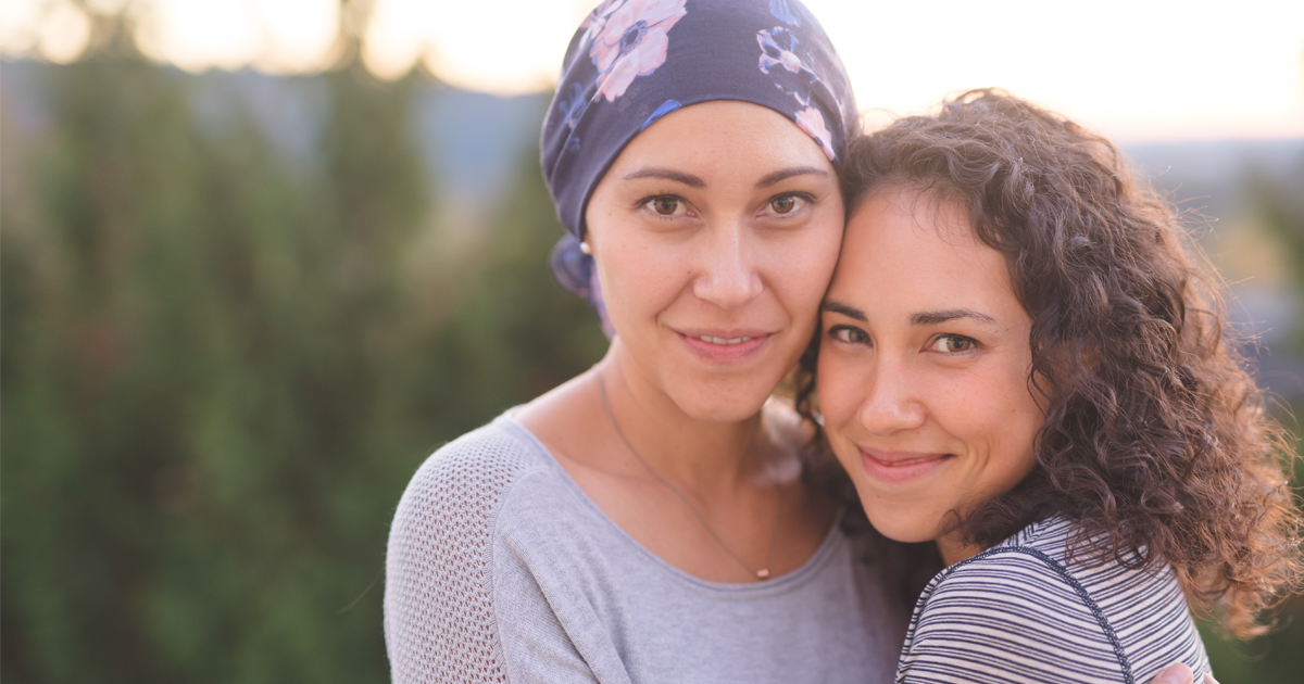 Two women smiling.