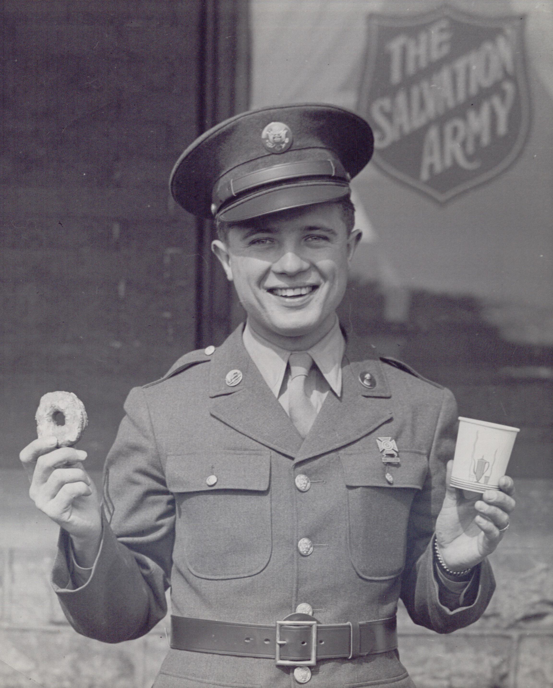 Dennison, OH Canteen - Serviceman Holding Donut and Coffee