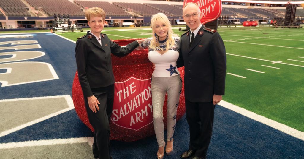 Dolly Parton with Commissioners Kenneth and Jolene Hodder.